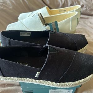 This is for two pairs of Tom’s shoes. Black and white